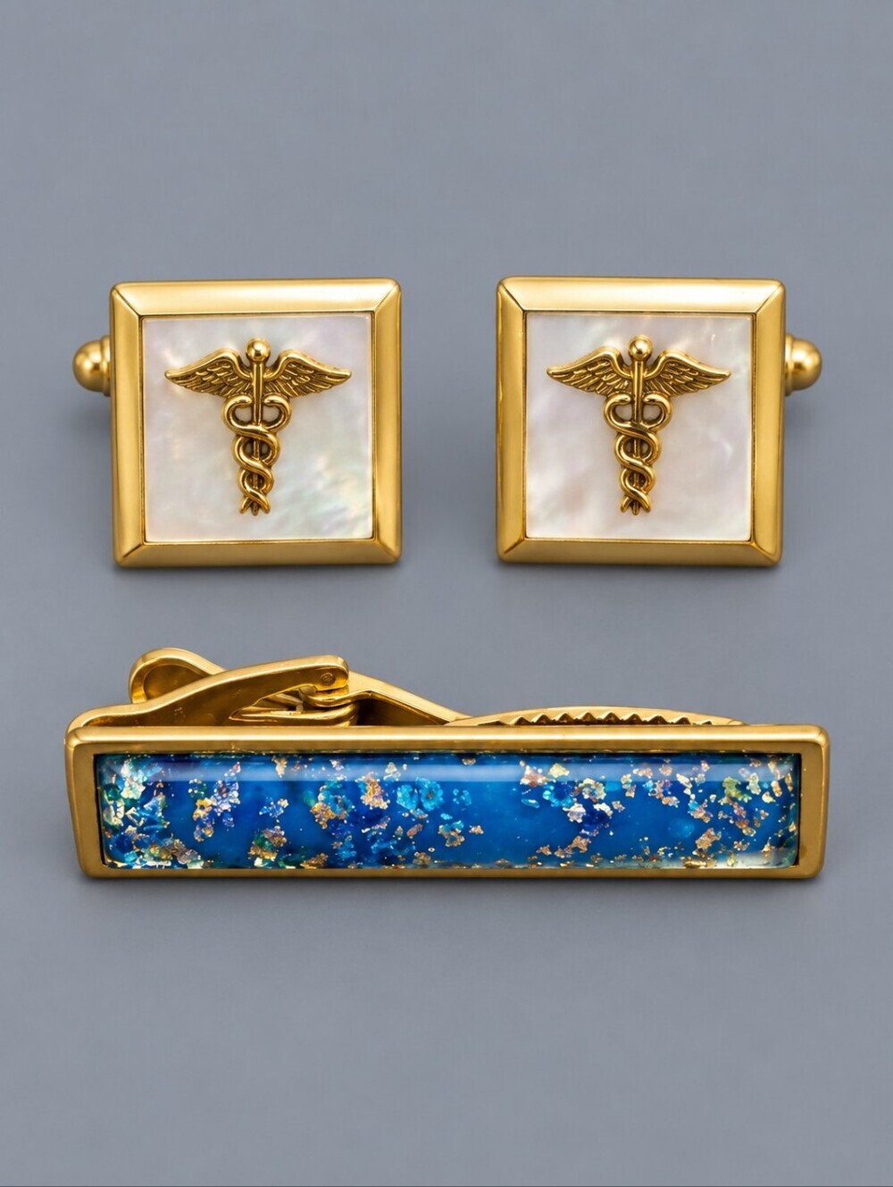 Vintage Goldtone MOP Caduceus Cufflinks and Blue Resin Tie Clip Set